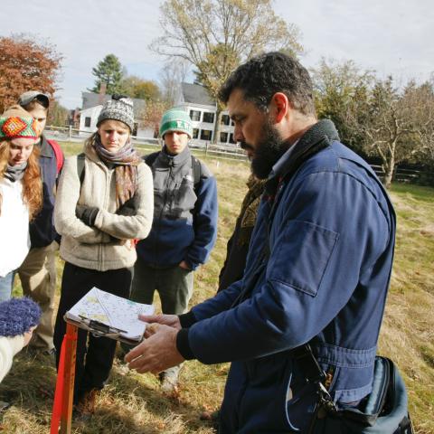 Students review map details with Professor Donahue